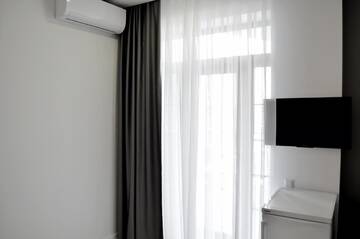 Фото номера Семейный номер с видом на море Отель Klaster SeaView Hotel г. Черноморск 3